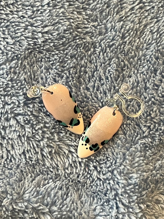 Nails turned into clip on earrings. French leopard print design 